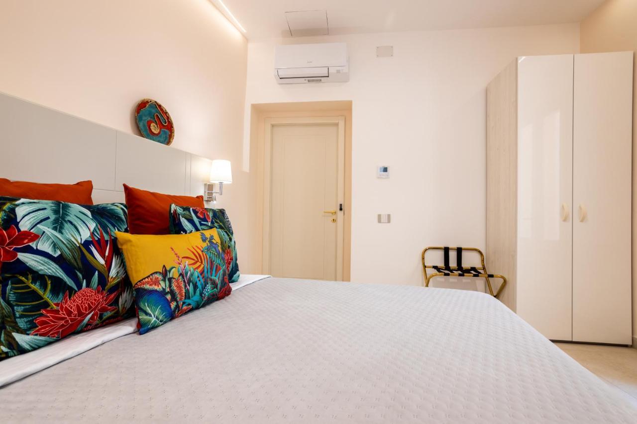 Magnini Rooms กาญารี ภายนอก รูปภาพ