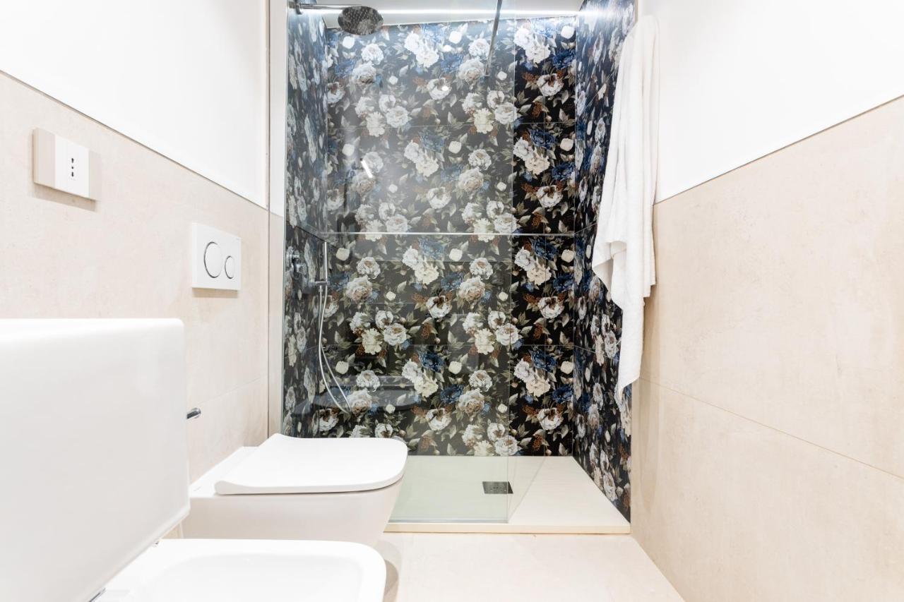 Magnini Rooms กาญารี ภายนอก รูปภาพ