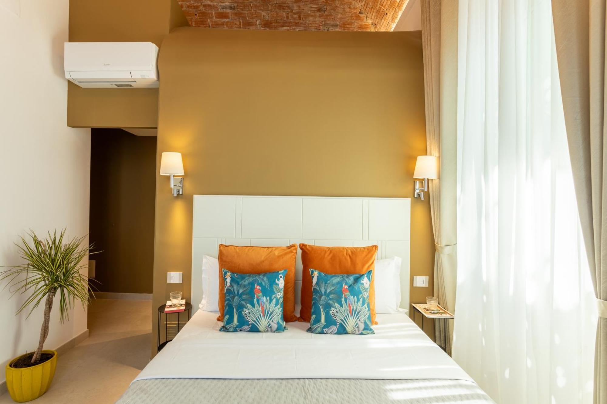 Magnini Rooms กาญารี ภายนอก รูปภาพ