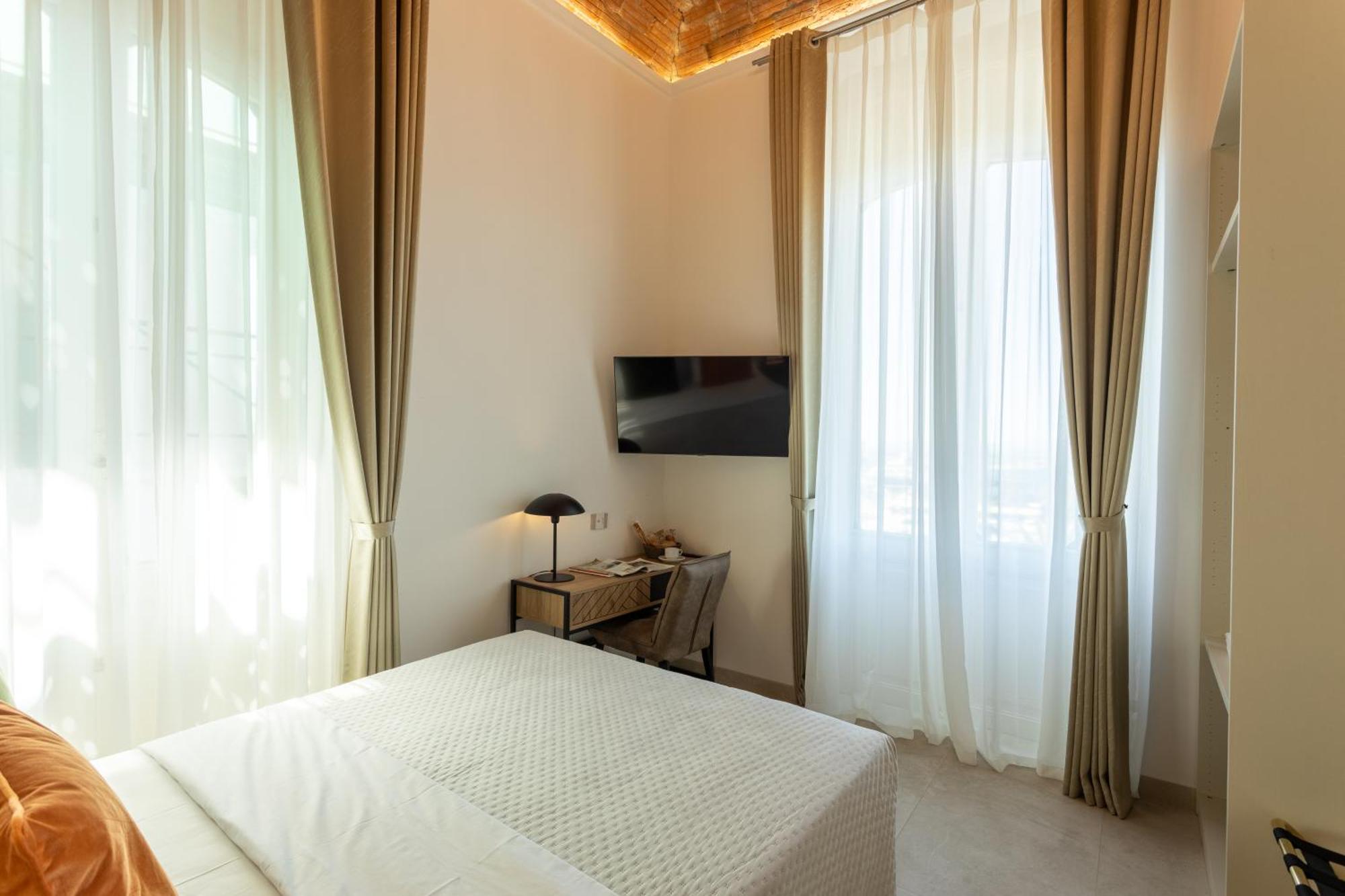 Magnini Rooms กาญารี ภายนอก รูปภาพ