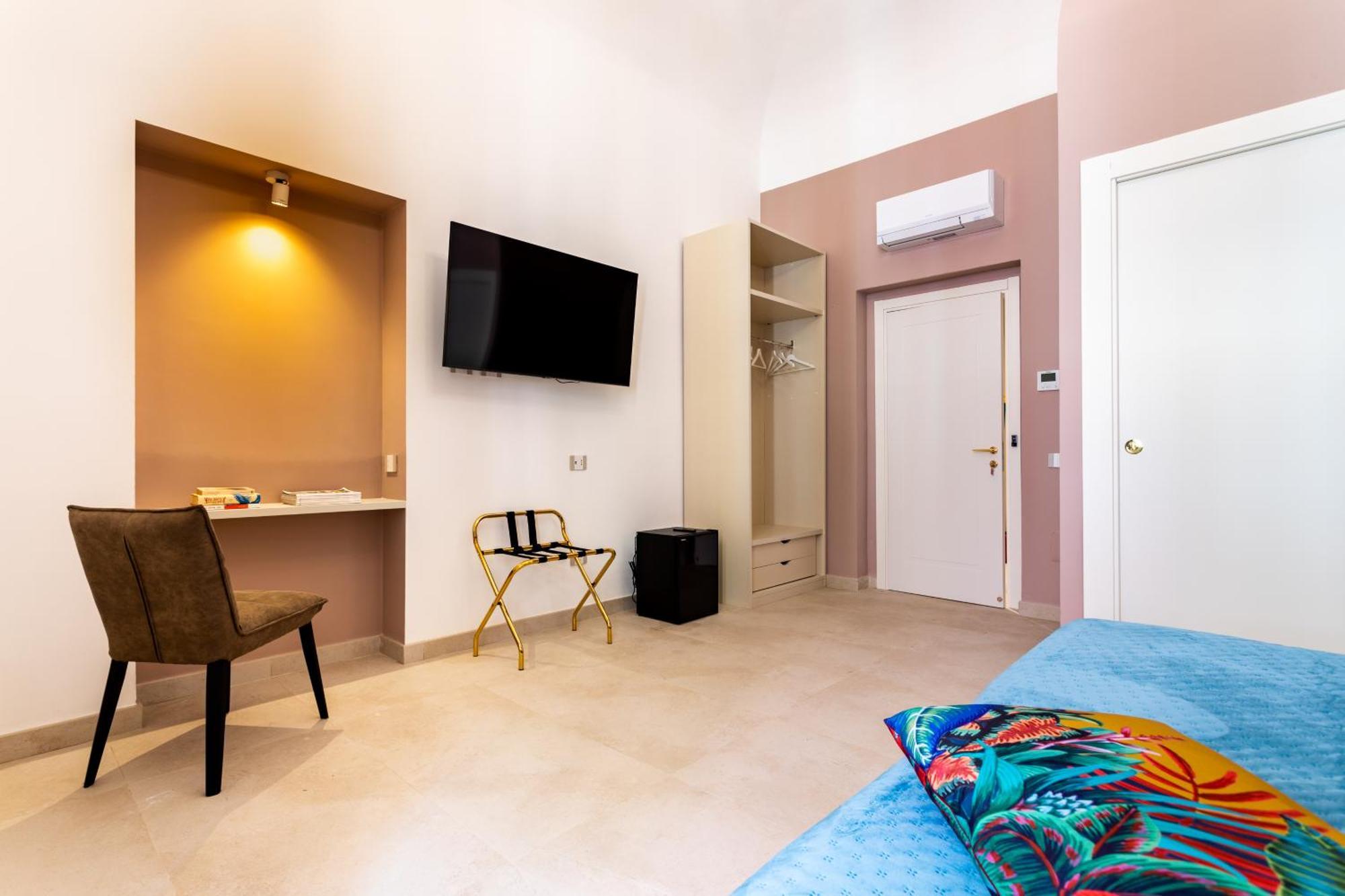 Magnini Rooms กาญารี ภายนอก รูปภาพ