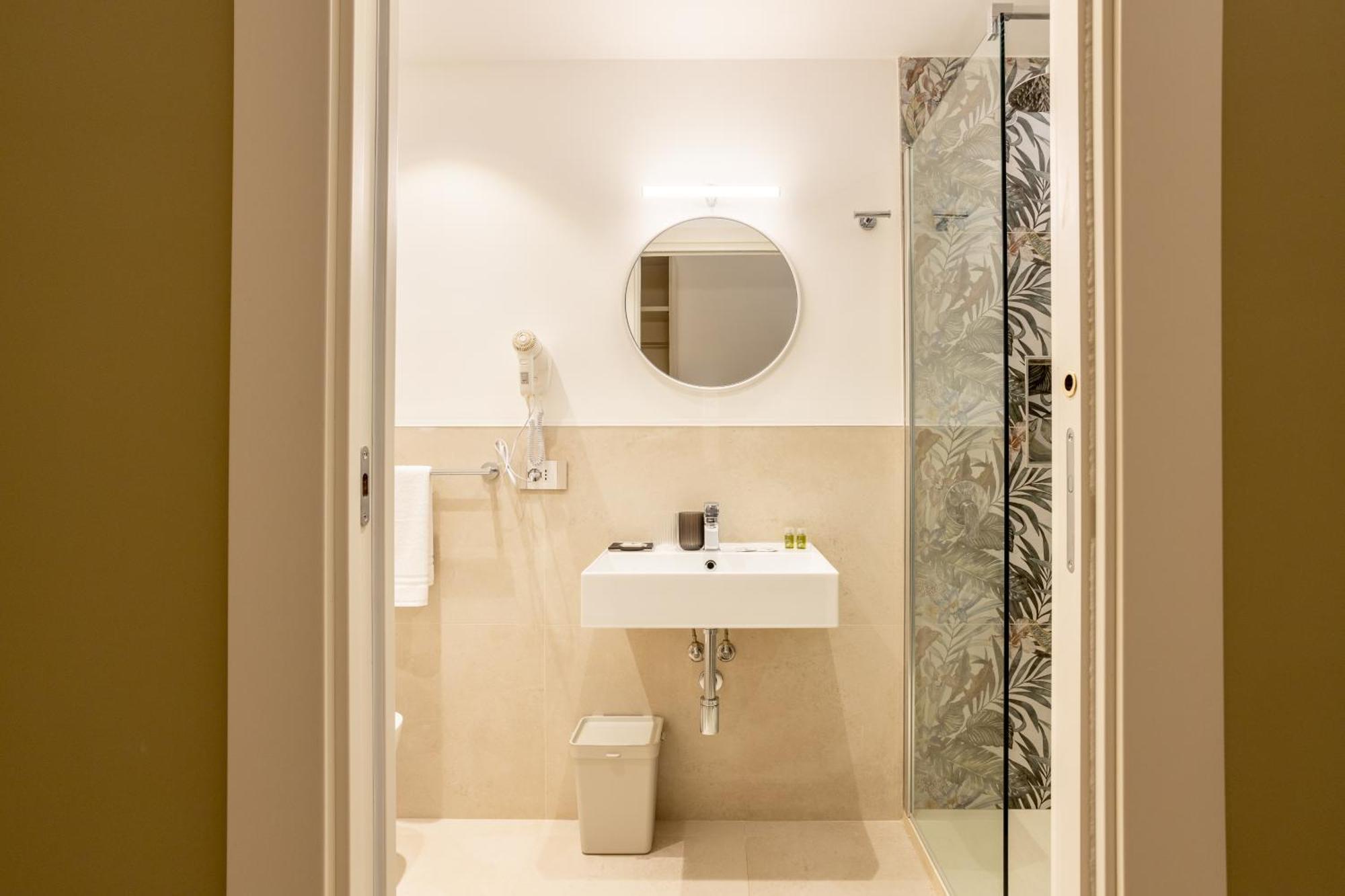 Magnini Rooms กาญารี ภายนอก รูปภาพ
