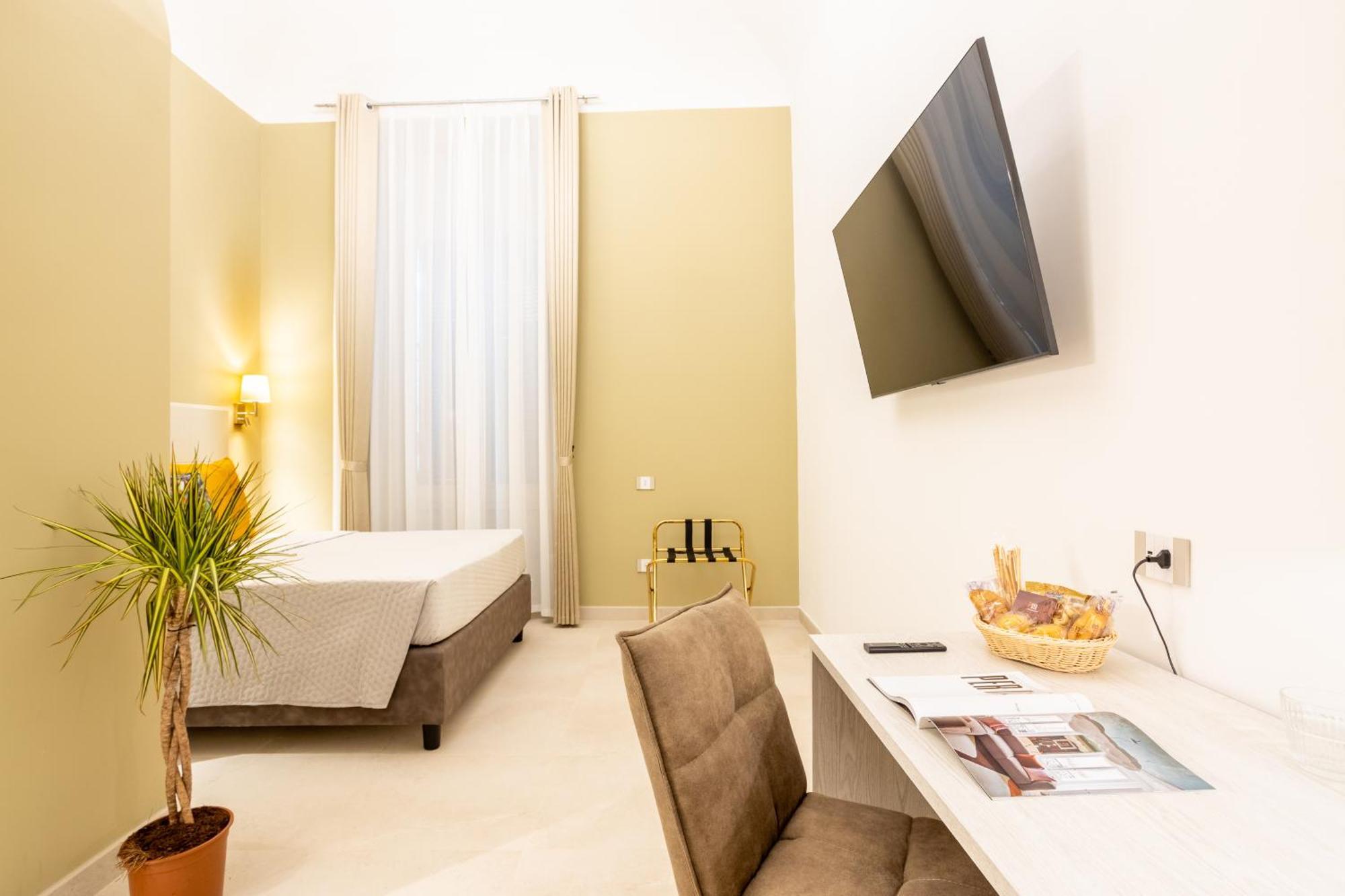 Magnini Rooms กาญารี ภายนอก รูปภาพ